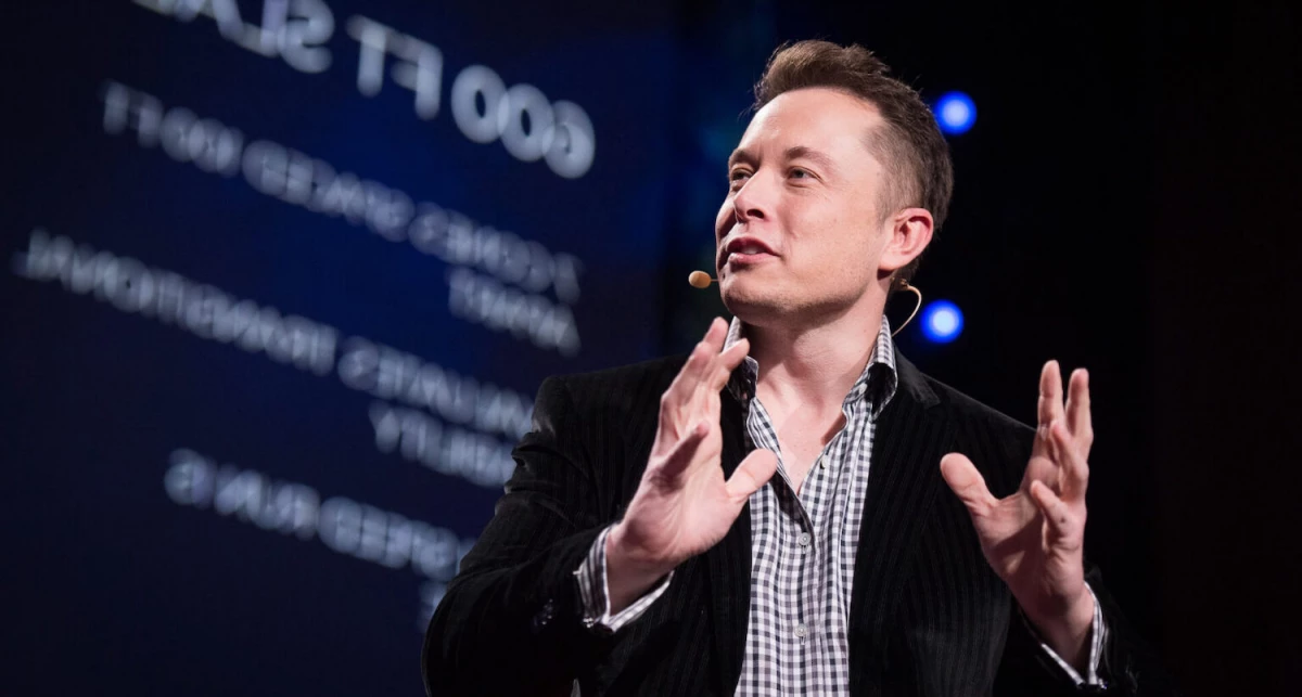 Elon Musk speaking at an event.