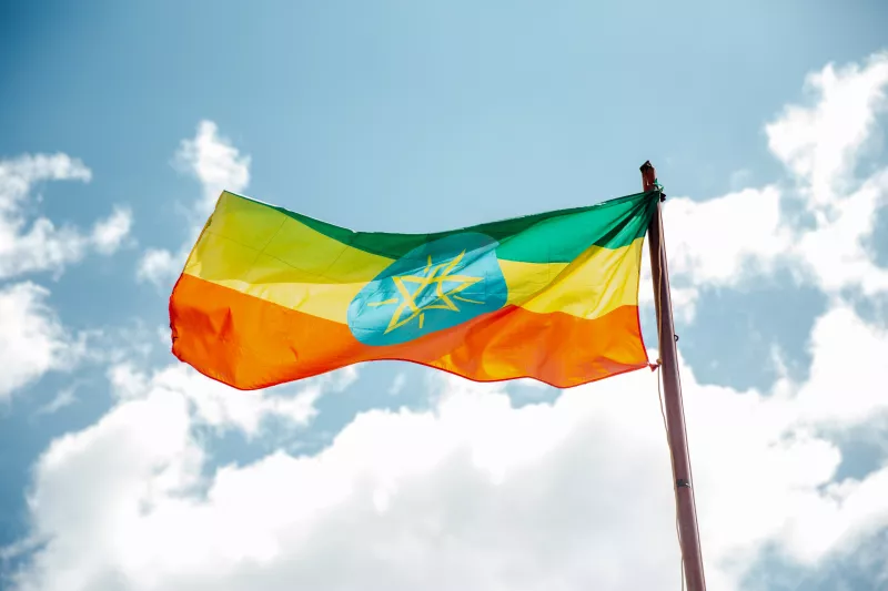 The Ethiopian flag waving in the wind.