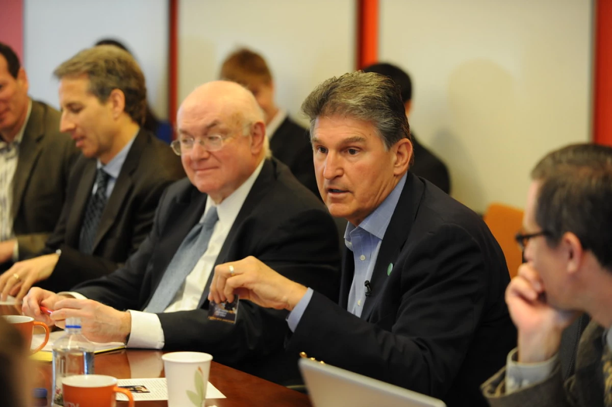 Inside Politics Press Breakfast - April 2013 featuring Sen. Joe Manchin III sitting at table answering questions.