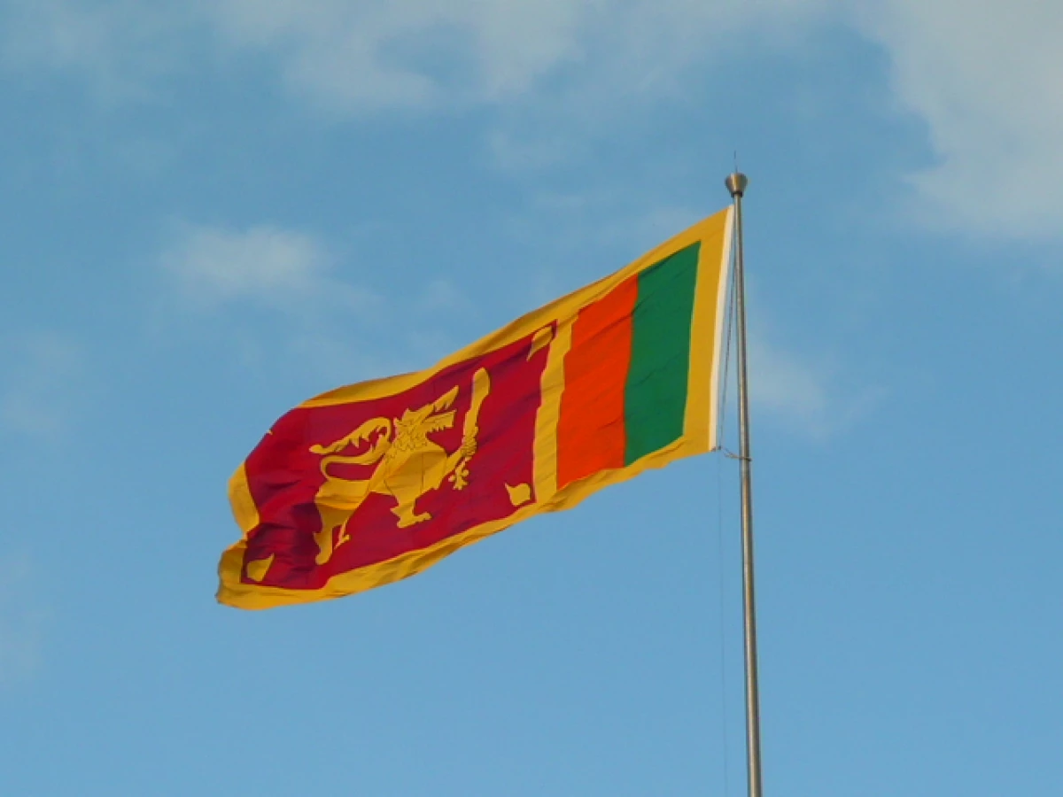 The Sri Lankan flag waving in the wind.