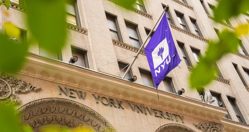 NYU flag on building.